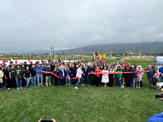 Roughly 100 people supporting the Mayor and sponsors of the ribbon cutting ceremony.